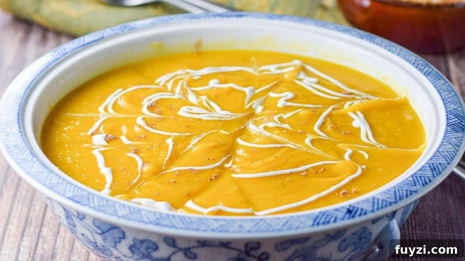 Creamy Roasted Butternut Squash Soup Recipe 3 Blue bowl filled with the squash soup