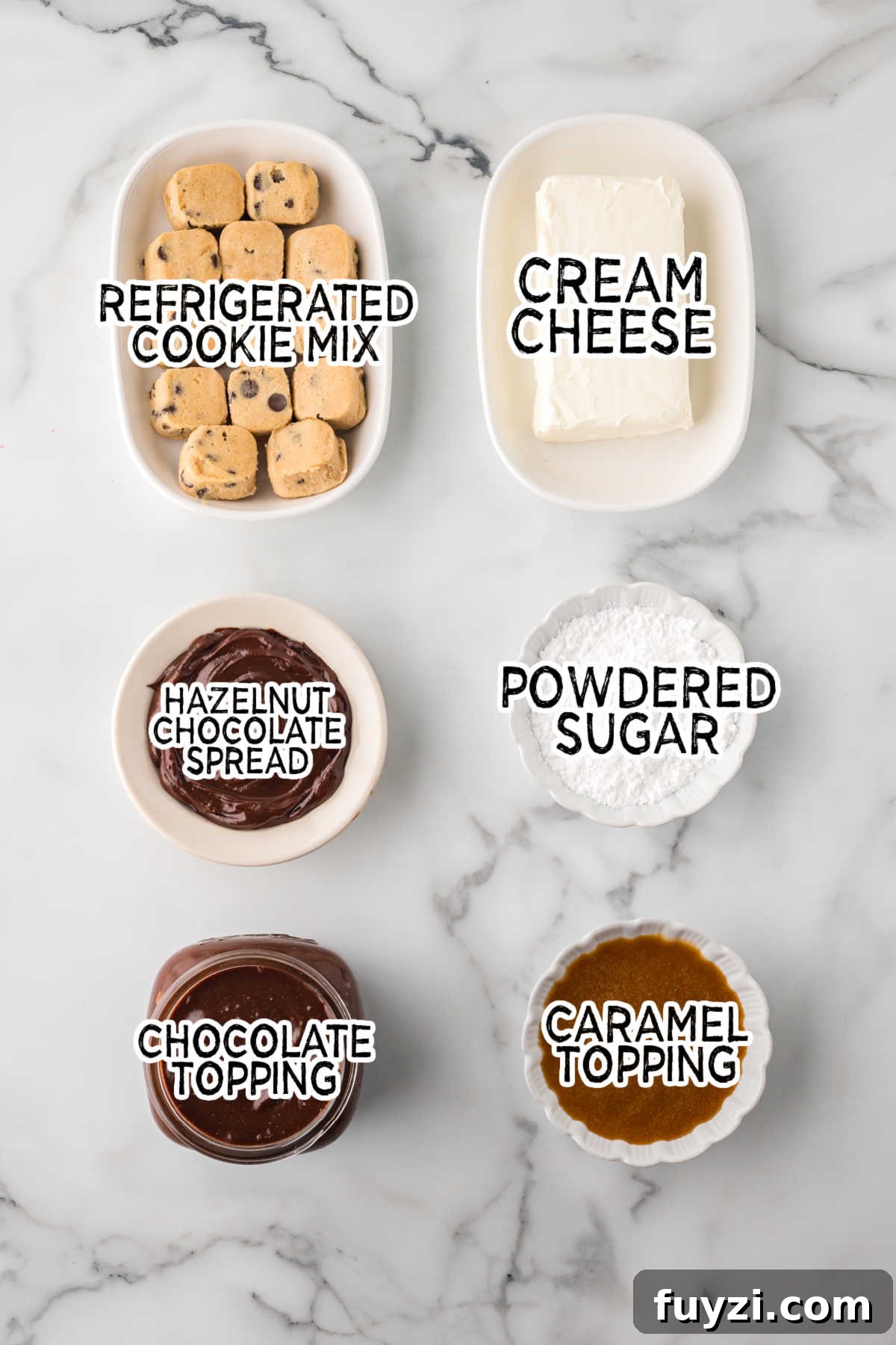 Ingredients on a white marble counter.
