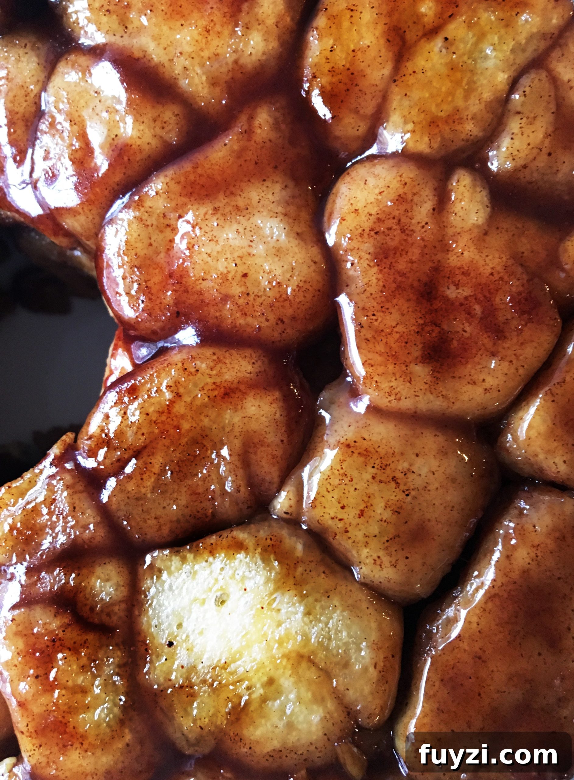 Homemade Cinnamon Pull-Apart Bread 5 closeup of caramel syrup over bread