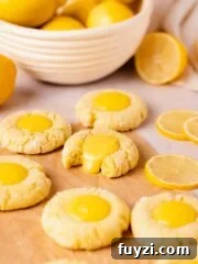 crinkle cookies with lemon curd filling and one bitten cookie
