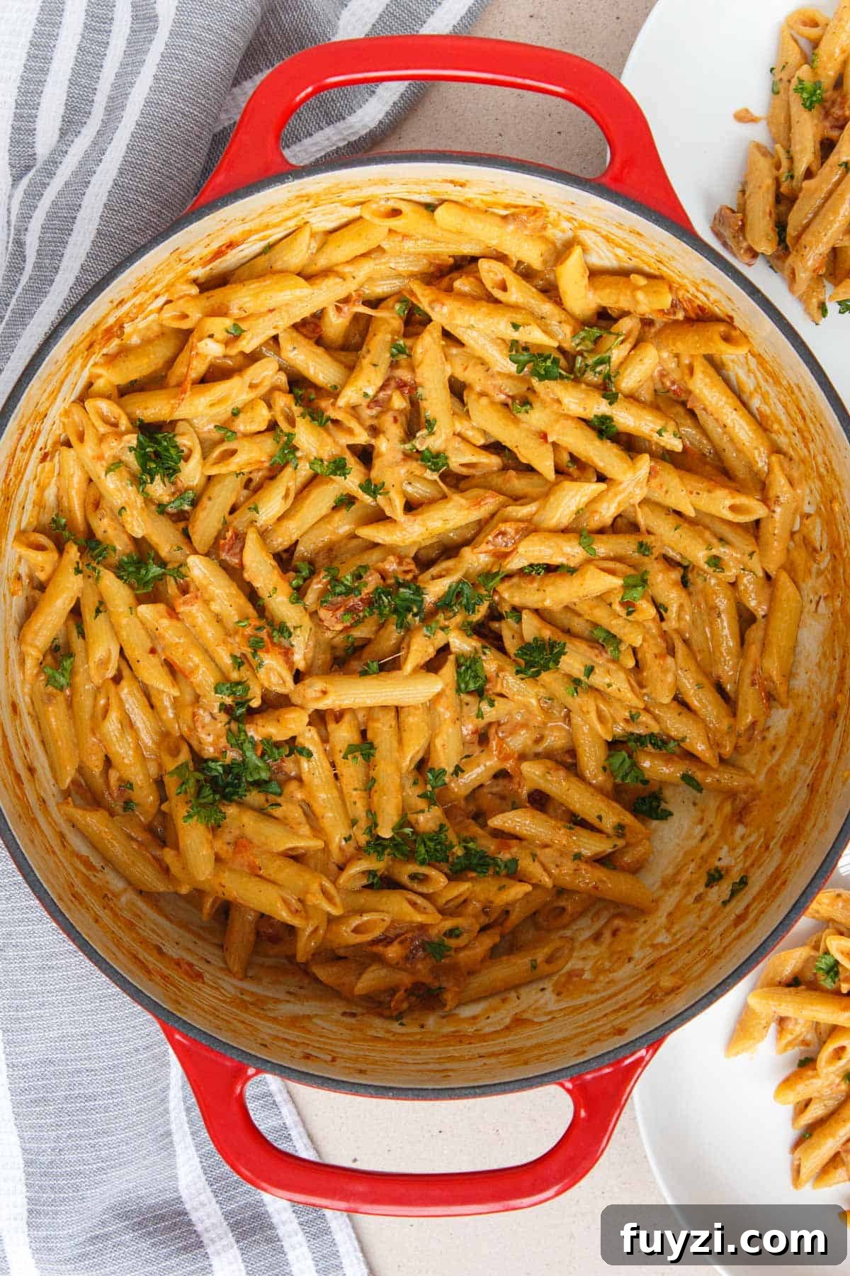 One Pot Sun-Dried Tomato Pasta garnished with fresh parsley