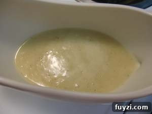 Onion gravy in a saucepan