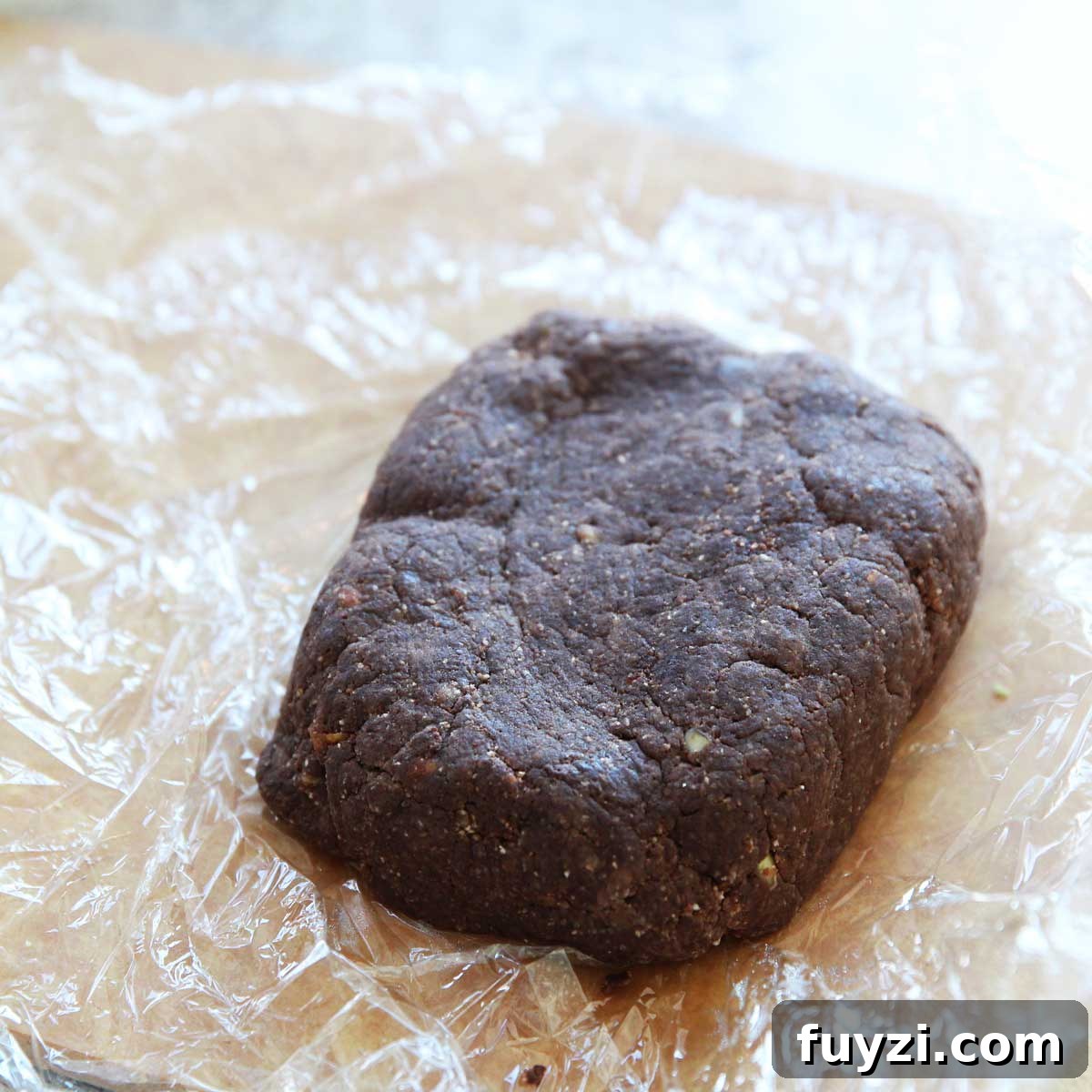 Rectangular mound of dough wrapped and chilled