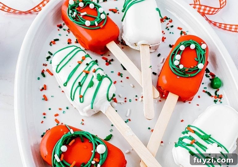 How to Make Festive Christmas Cakesicles 2 cakesicles on a platter