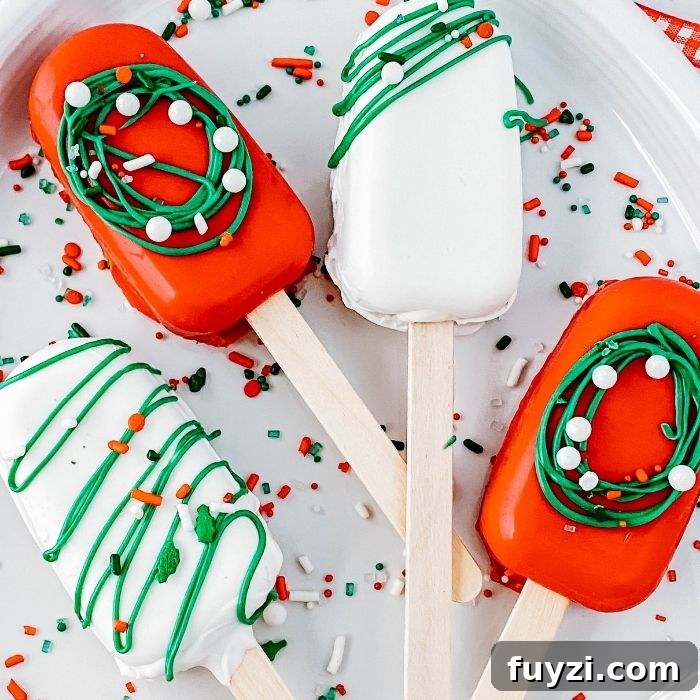 cakesicles on a plate with sprinkles around it
