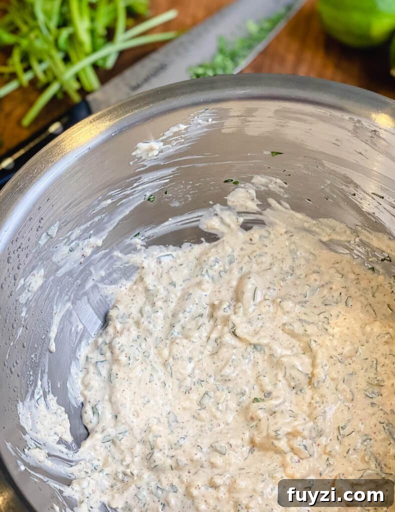 dressing for Mexican street corn salad in a bowl