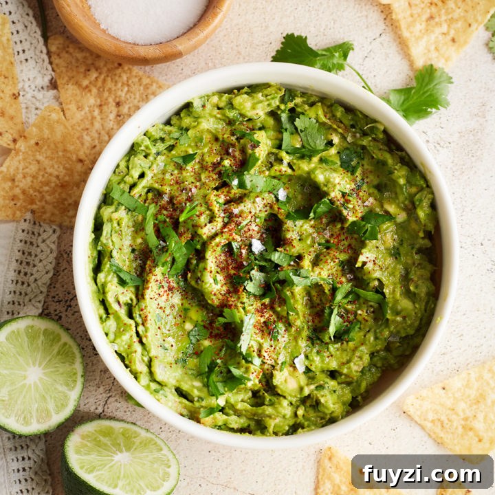 15 Nutritious Snacks to Kickstart Your New Year 15 Bowl of simple guacamole with cilantro