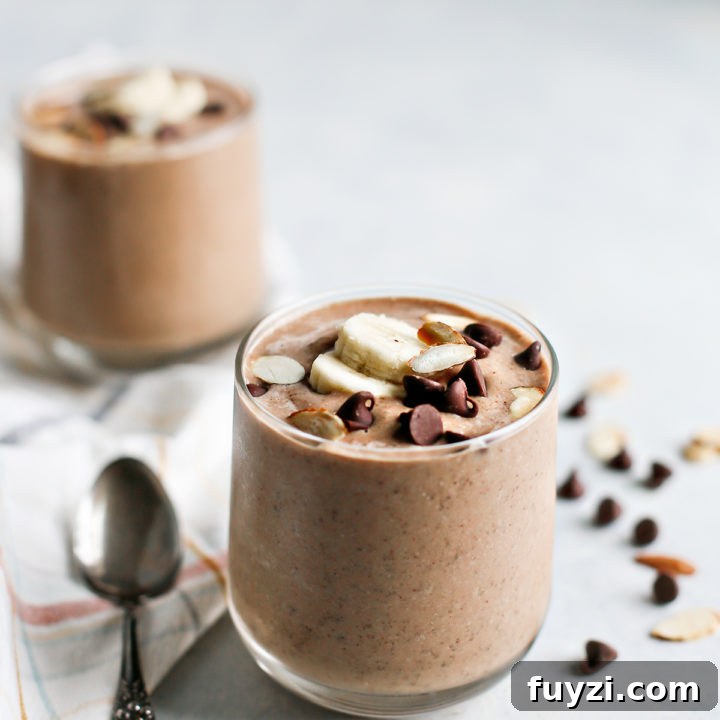 15 Nutritious Snacks to Kickstart Your New Year 17 Glass of banana chocolate smoothie