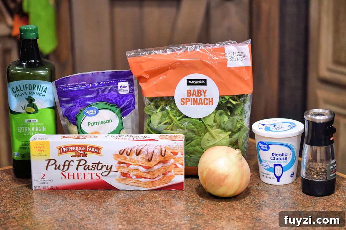 Spinach and Ricotta Puff Pastry Braid Recipe 3 ingredients for spinach ricotta puff pastry on a countertop