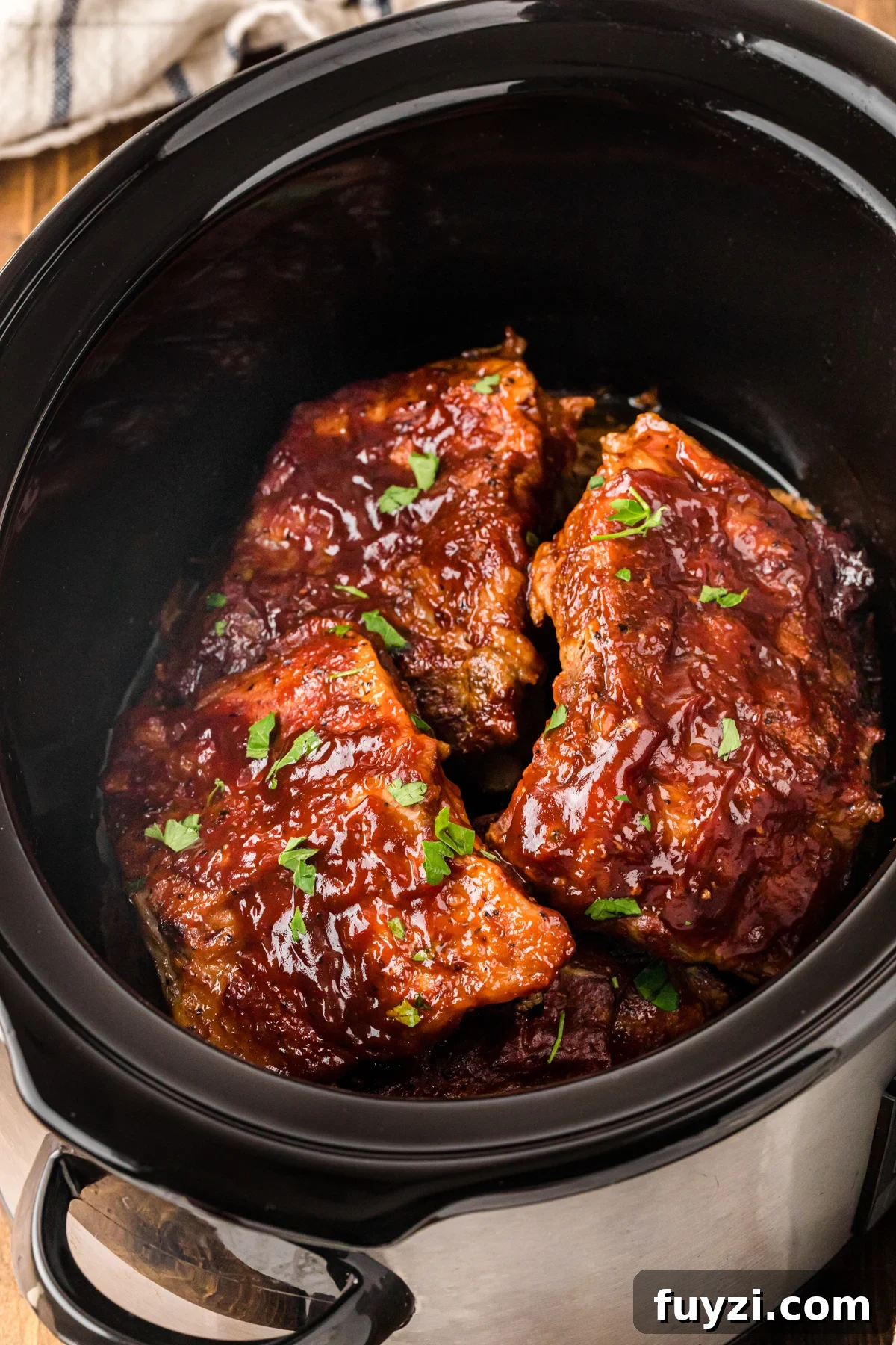 Slow cooker baby back ribs in a crockpot.
