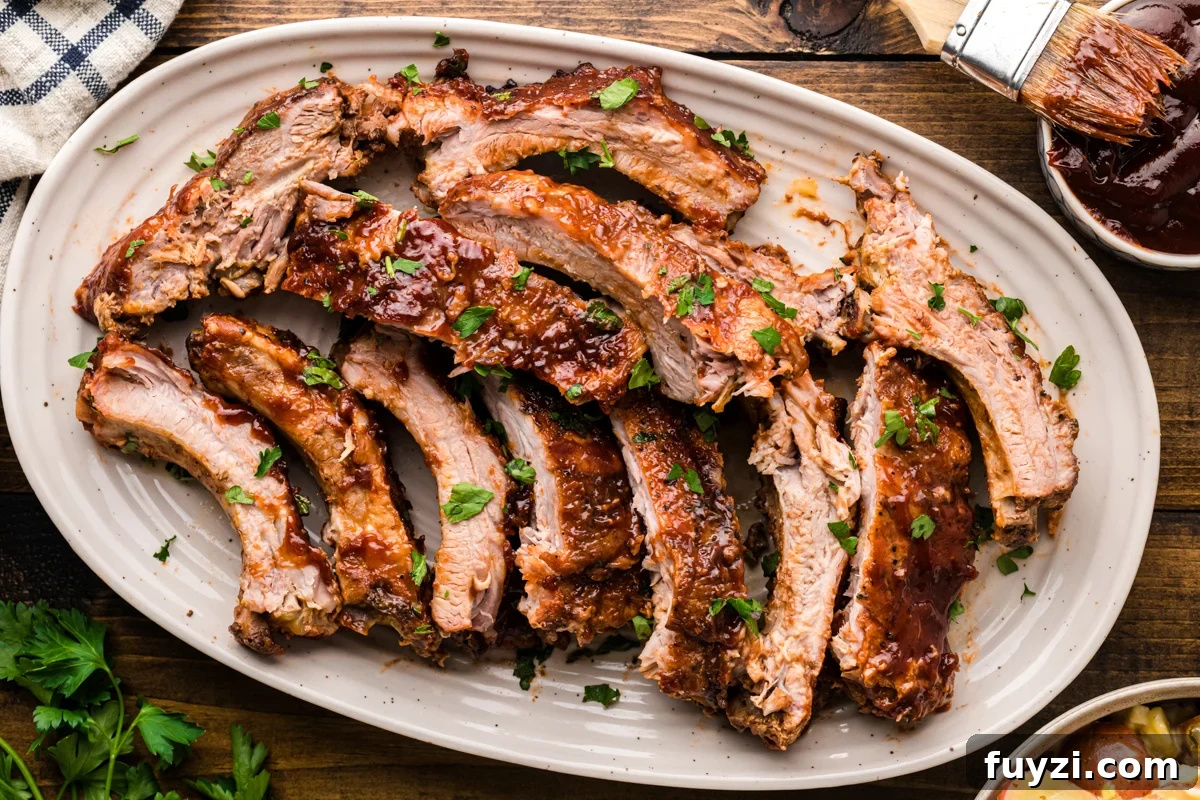 Slow cooker baby back ribs on a platter.