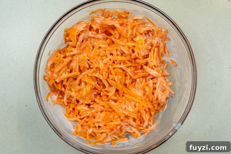 Mixing the carrots, buttermilk & vanilla