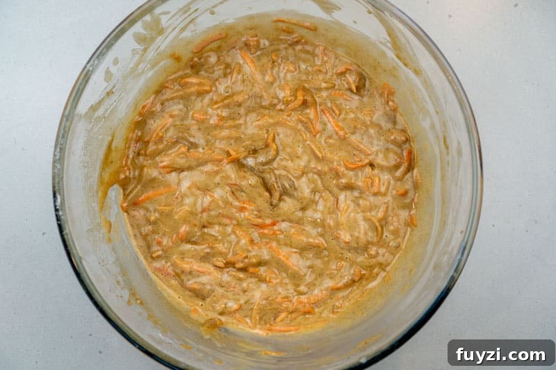 Adding in the carrot mixture