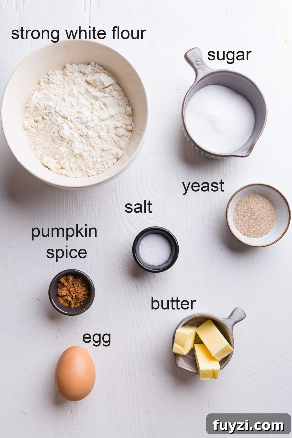 top view of the ingredients for pumpkin spice doughnuts