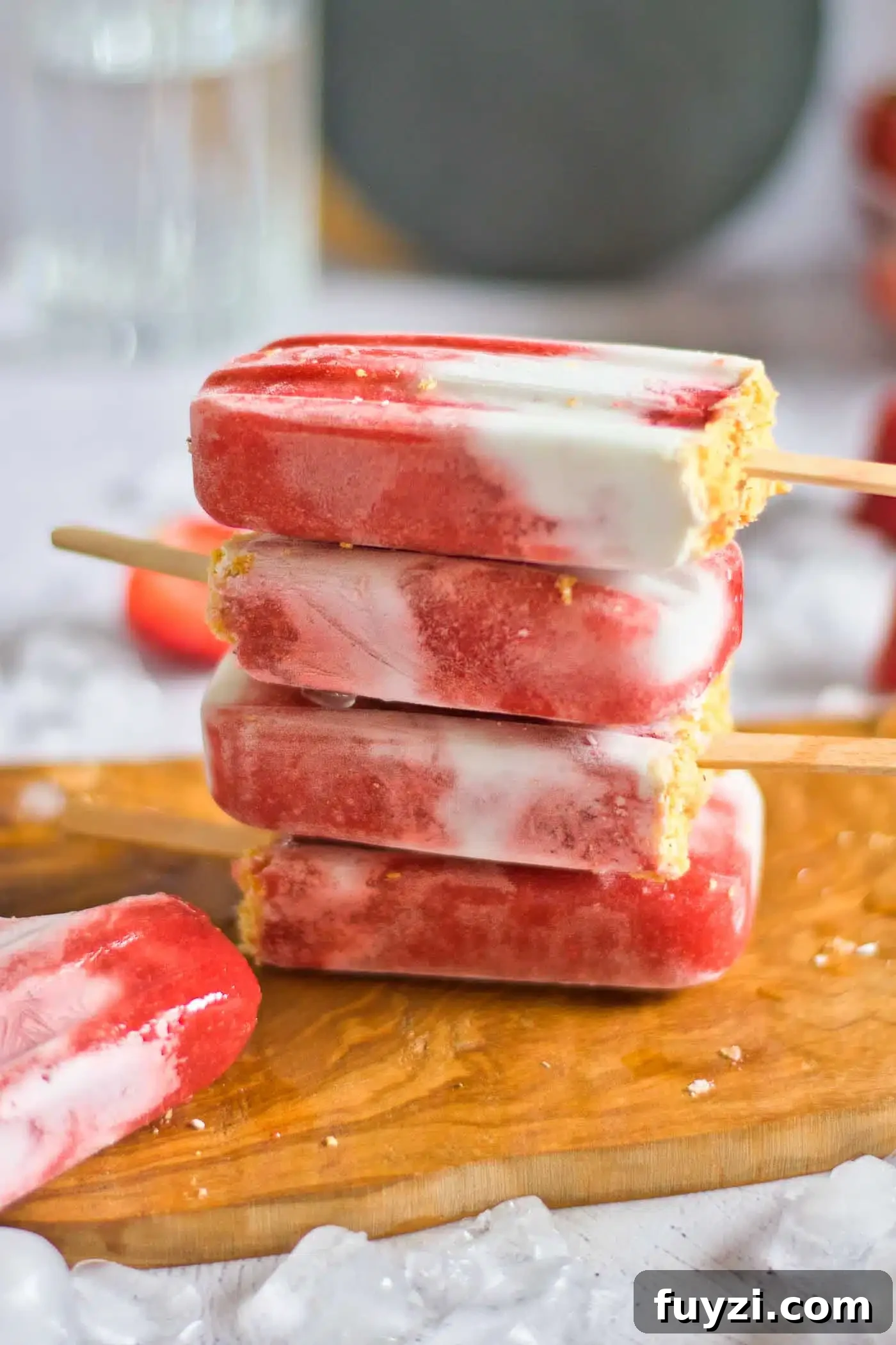Homemade Strawberry Popsicles Recipe 6 stacked fruit popsicles