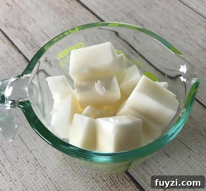 Easy DIY peppermint & charcoal detox soap recipe with peppermint essential oil. Helps increase circulation, unclogs pores, remove impurities, fight acne, and improve the health of your skin. {essential oils for skin, acne, faces, tightening, skincare, Young Living, doTERRA, activated charcoal, melt and pour soap} #essentialoils #essentialoilrecipes #essentialoilDIY #naturalDIY #essentialoilsoap #charcoalsoap #facesoap #charcoalfacesoap #peppermintessentialoil #homemadesoap