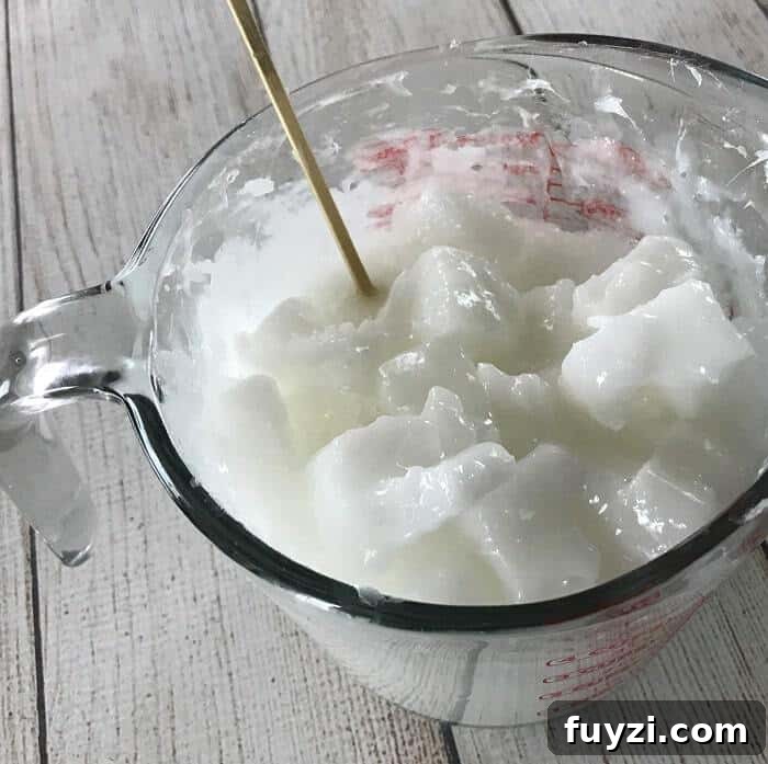 Easy DIY peppermint & charcoal detox soap recipe with peppermint essential oil. Helps increase circulation, unclogs pores, remove impurities, fight acne, and improve the health of your skin. {essential oils for skin, acne, faces, tightening, skincare, Young Living, doTERRA, activated charcoal, melt and pour soap} #essentialoils #essentialoilrecipes #essentialoilDIY #naturalDIY #essentialoilsoap #charcoalsoap #facesoap #charcoalfacesoap #peppermintessentialoil #homemadesoap