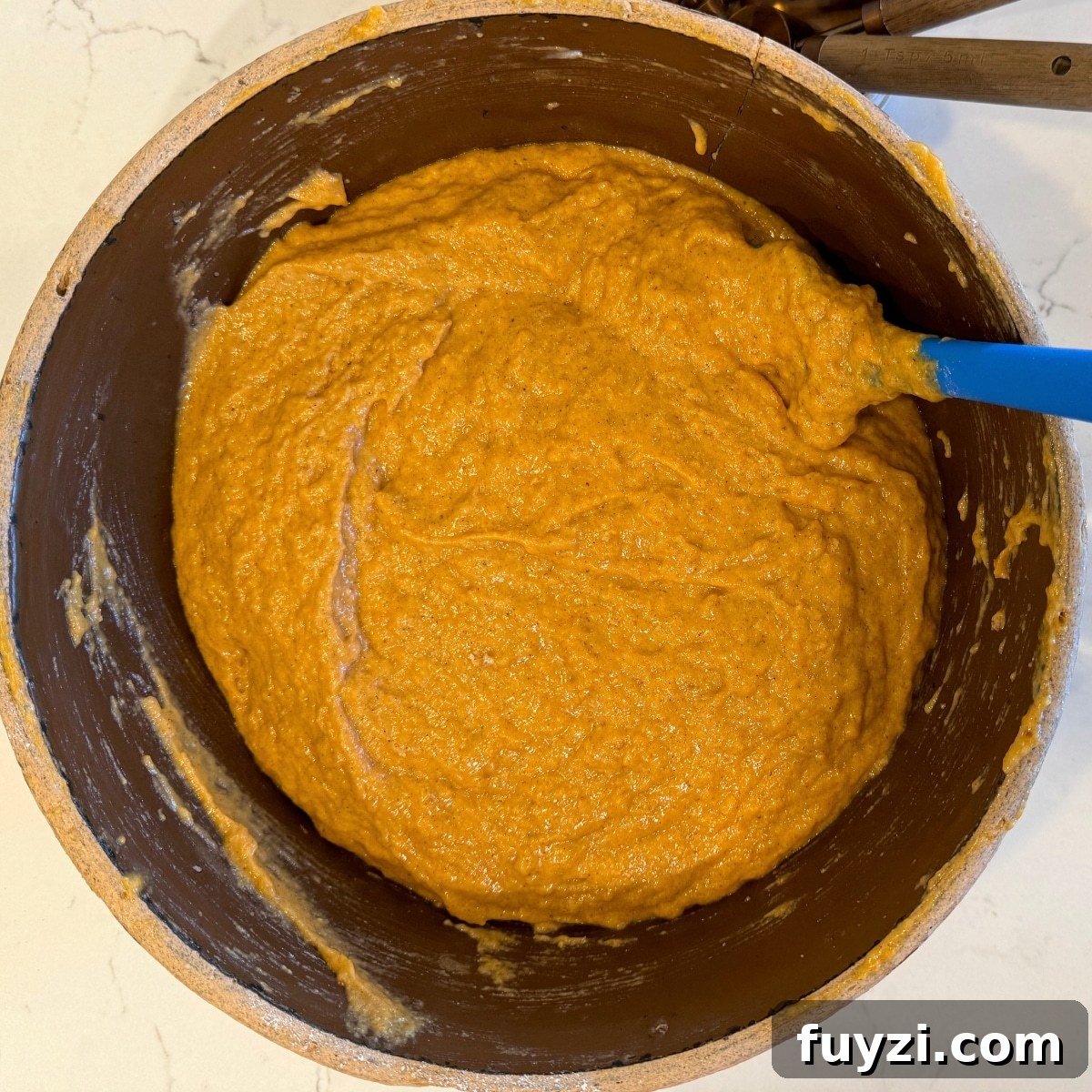 How to Make Moist Sourdough Pumpkin Bread 4 sourdough pumpkin bread dough in mixing bowl