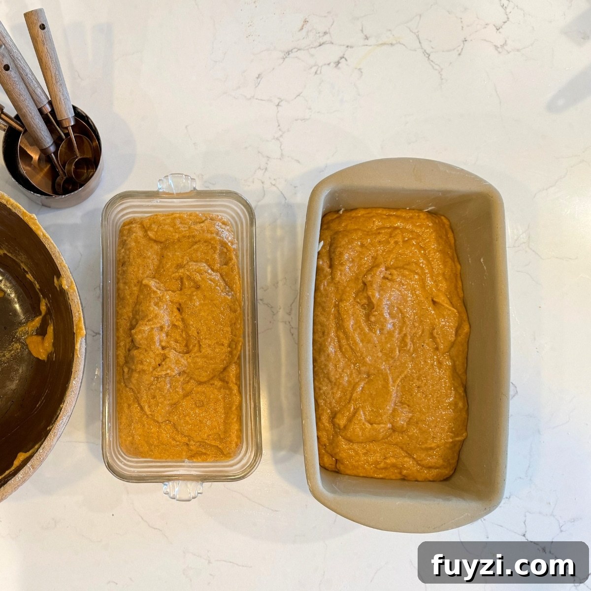 How to Make Moist Sourdough Pumpkin Bread 5 sourdough pumpkin bread dough in buttered loaf pans