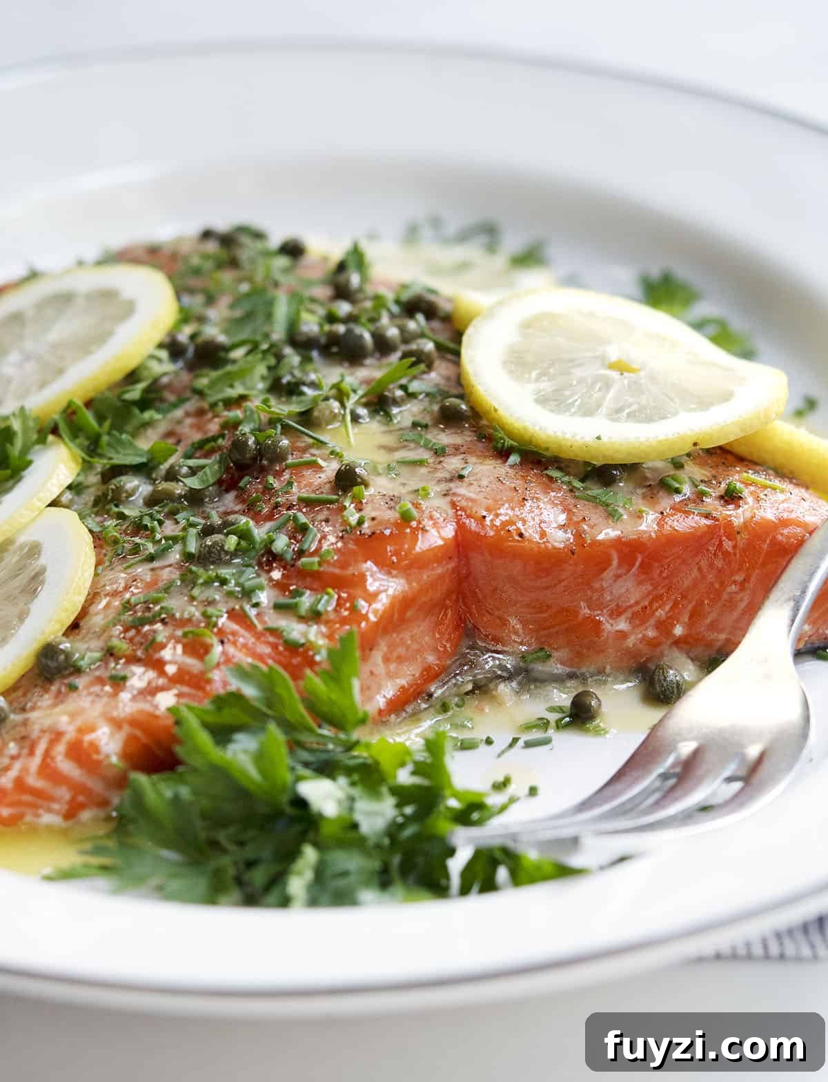 Slow Roasted Salmon served on a white oval platter