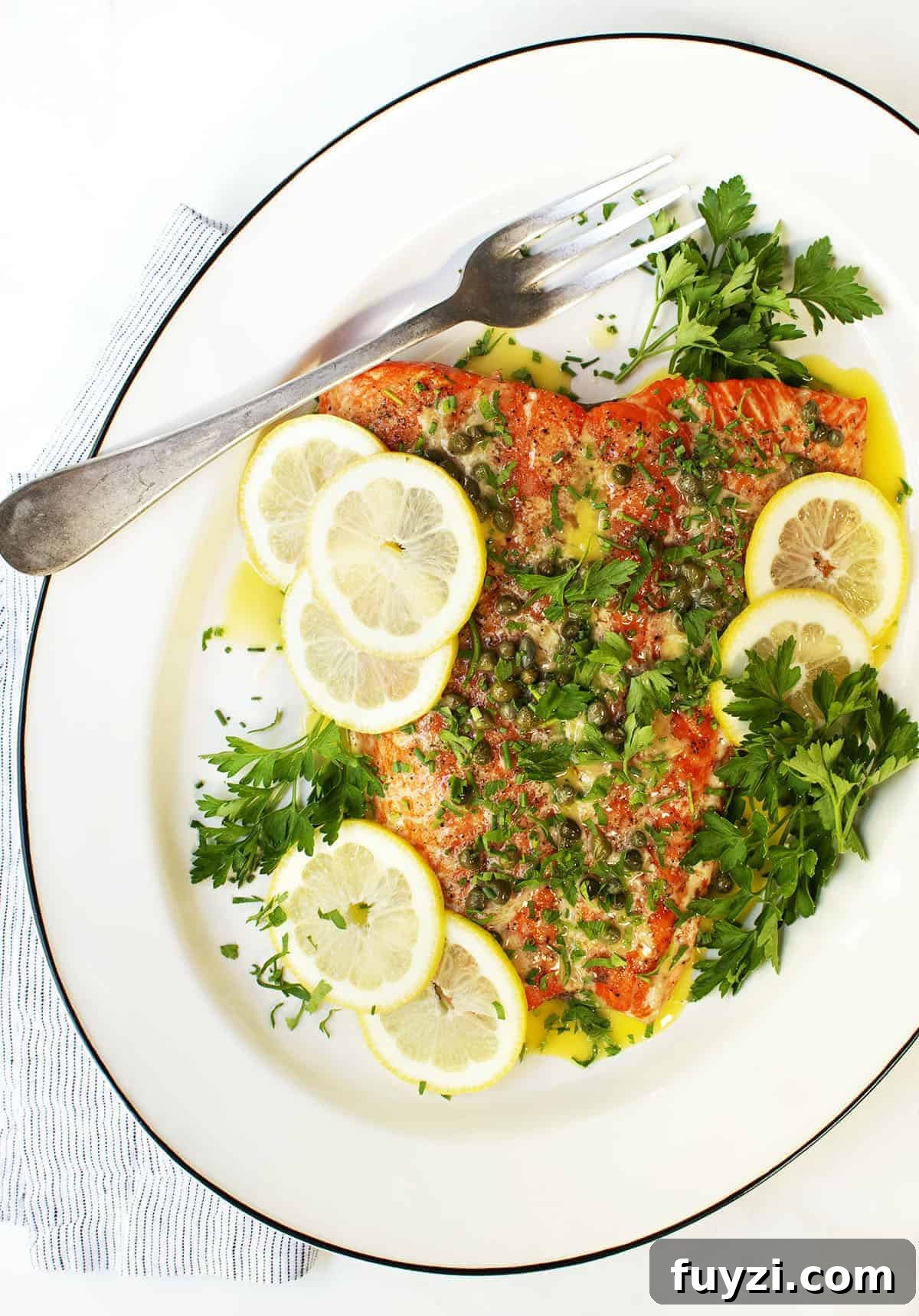 Slow Roasted Salmon served on a white oval platter