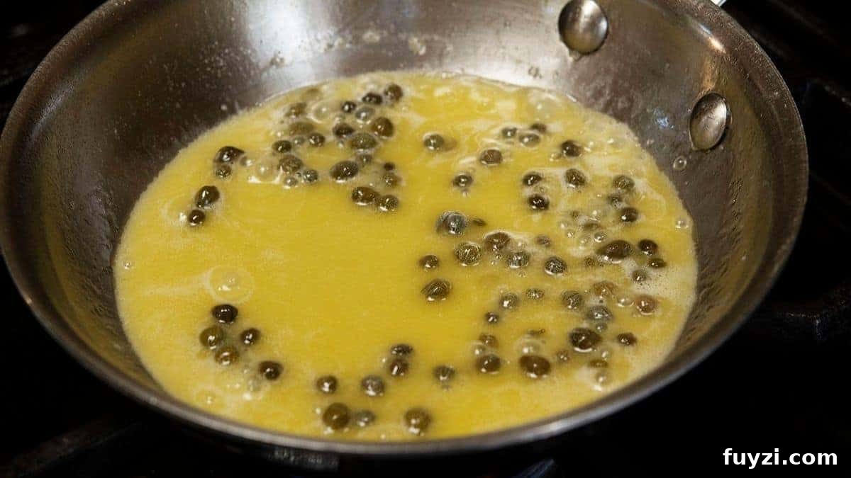 lemon butter sauce with capers in skillet