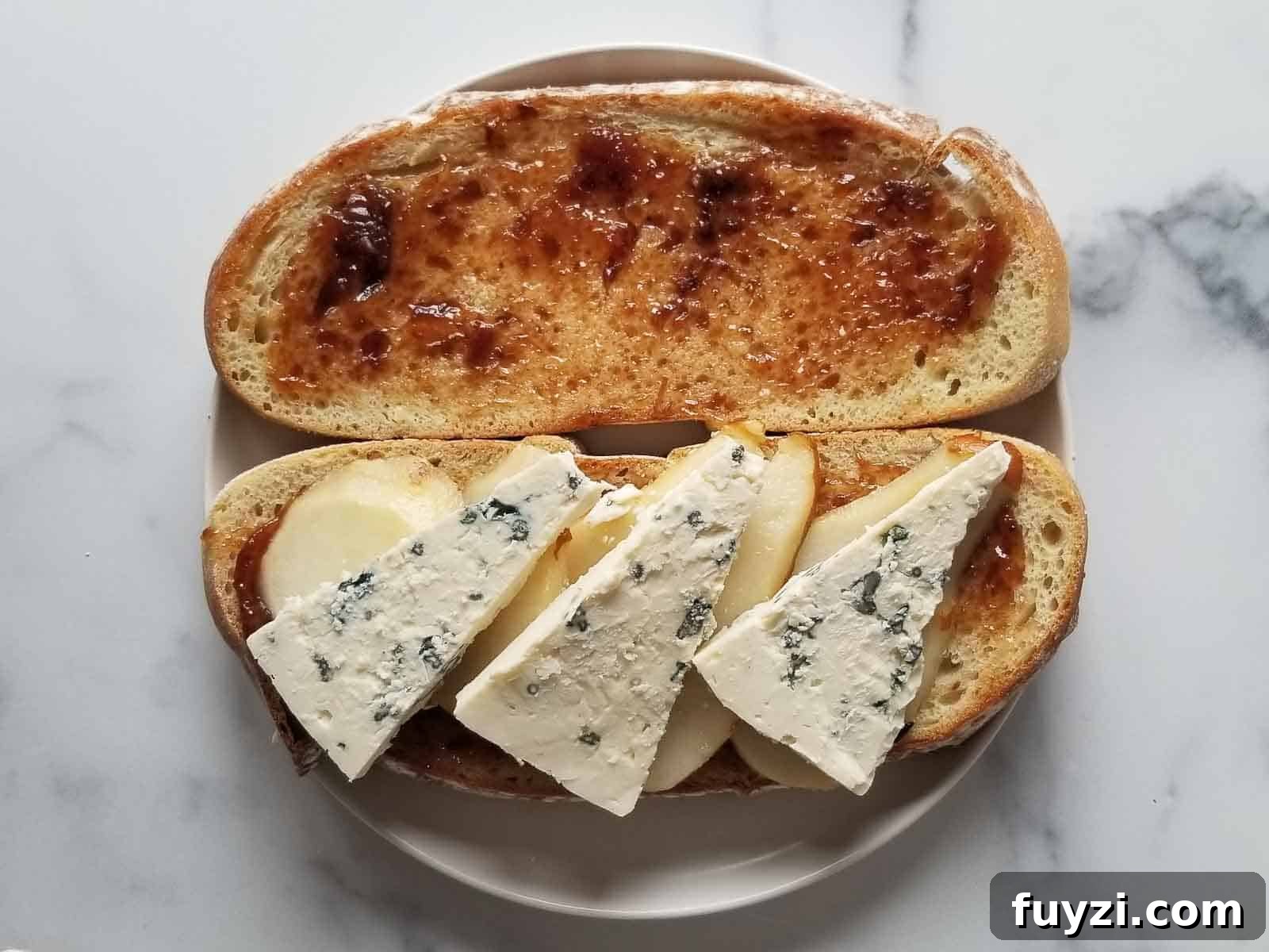 Gorgonzola and Pear Grilled Cheese Recipe with Jam 6 Bread prepared with fig jam, pears, and gorgonzola.