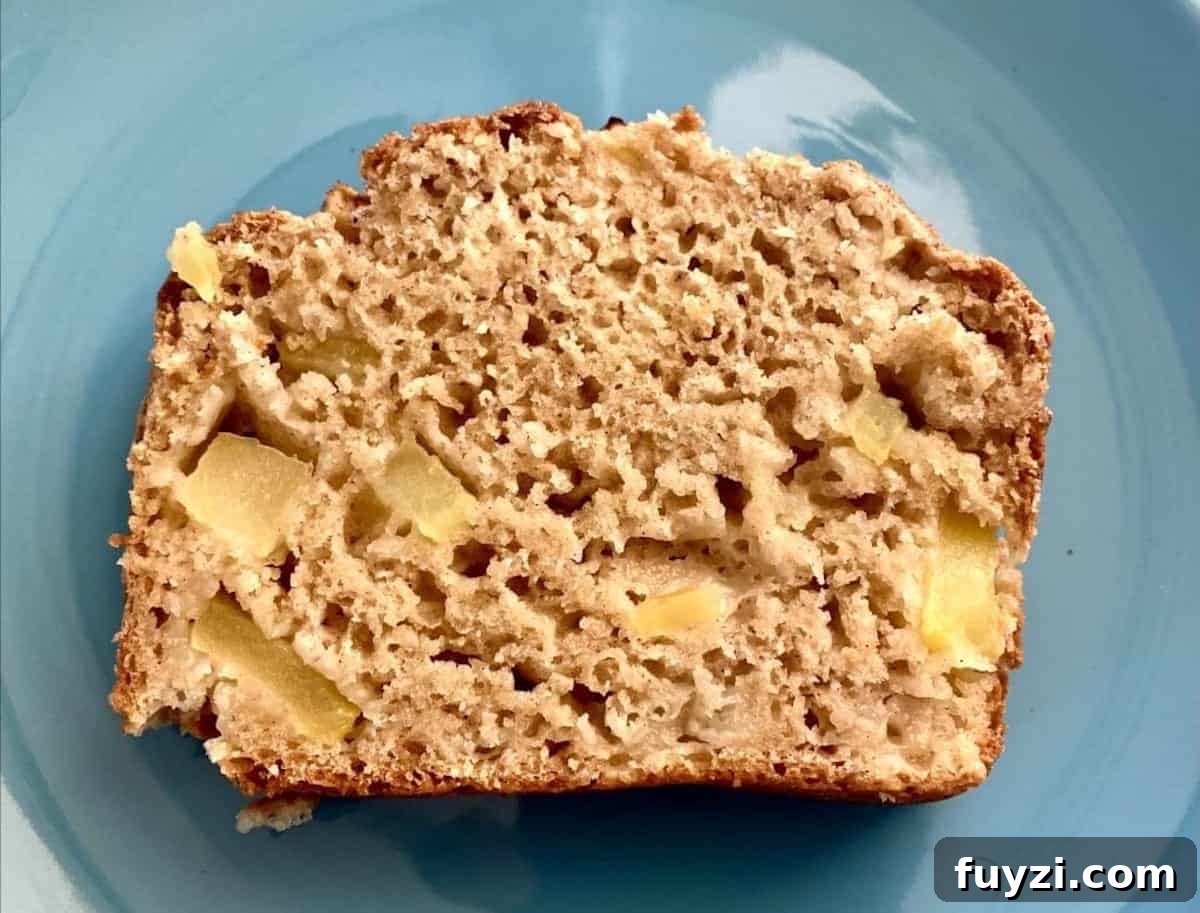 A slice of apple bread on a plate