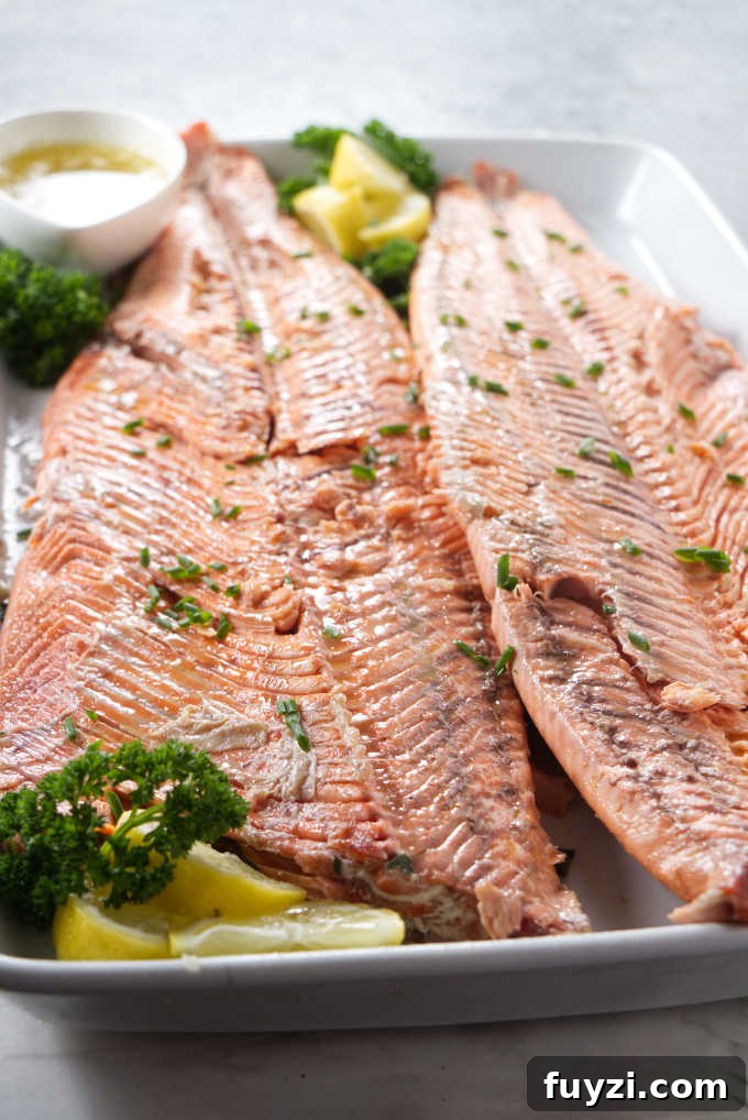 Grill a Whole Salmon: Step-by-Step Guide 9 A whole grilled salmon with the skin and bones removed.