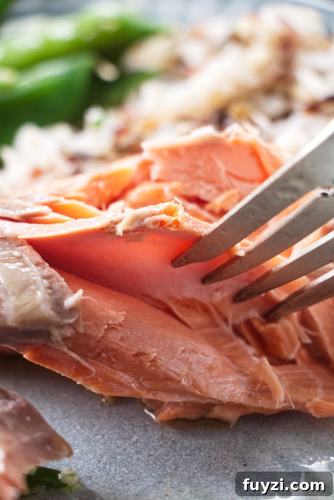 Grill a Whole Salmon: Step-by-Step Guide 10 A serving of salmon showing the flaky meat.