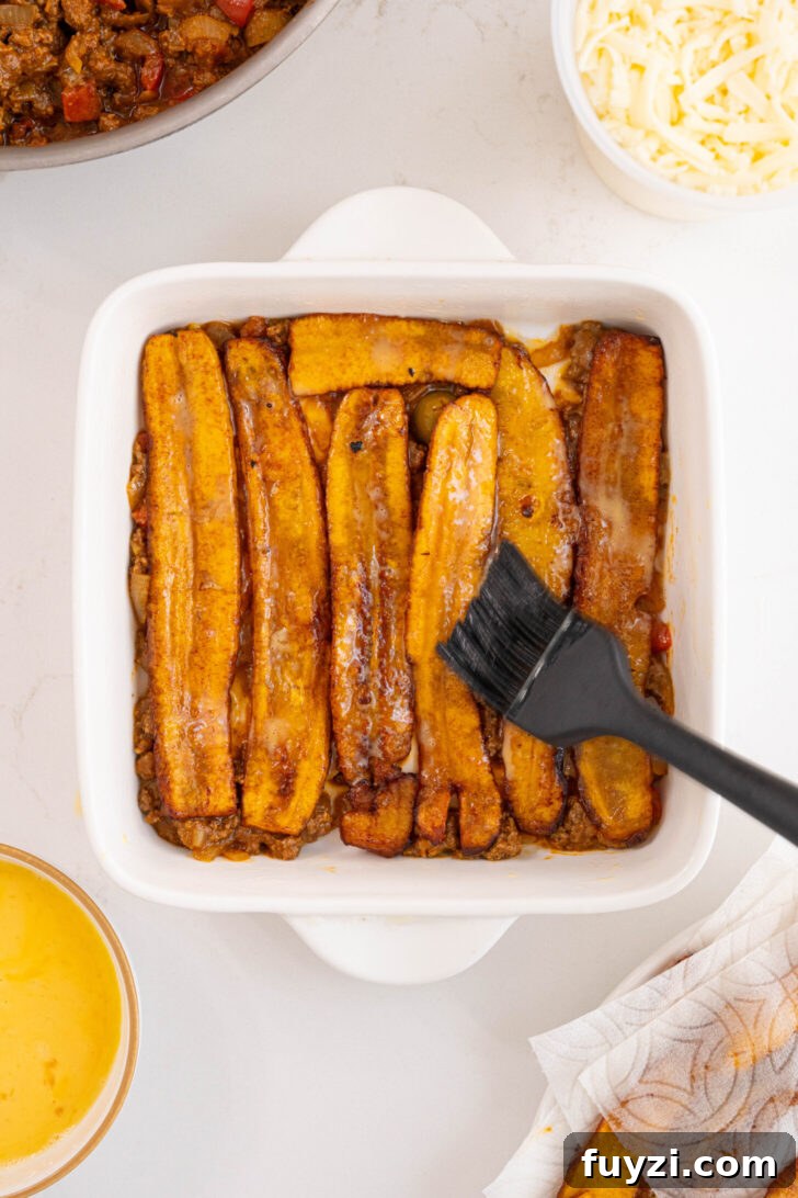 A pastelon being assembled.