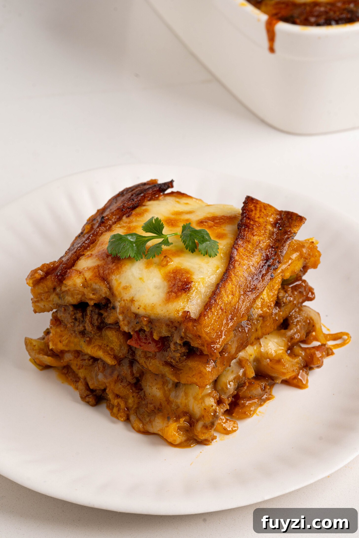 A slice of pastelon on a plate.