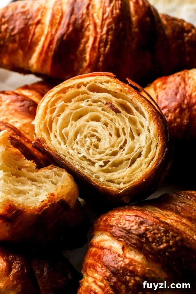 How to Make Flaky Homemade Croissants: French Recipe 2 close up of the inside of croissants