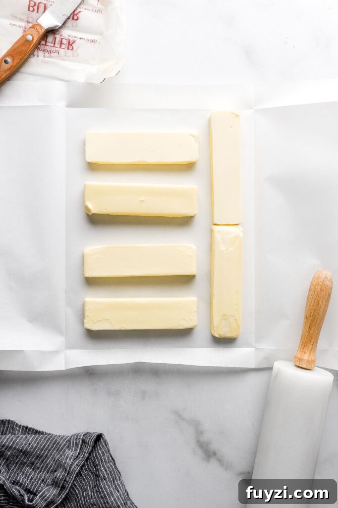 How to Make Flaky Homemade Croissants: French Recipe 7 place butter inside of parchment