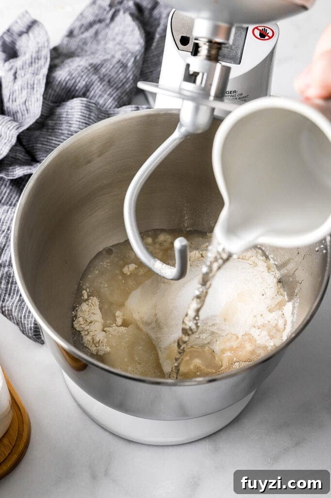 How to Make Flaky Homemade Croissants: French Recipe 4 ingredients for dough being added to the bowl