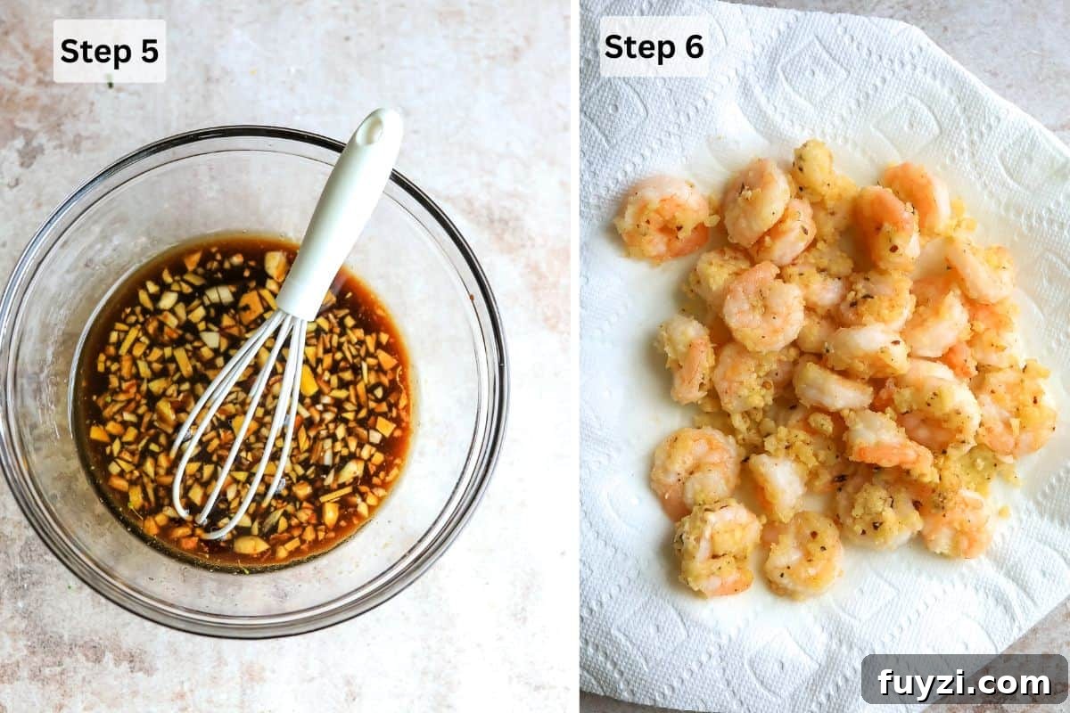 Glass bowl with sauce and garlic and shrimp on a paper towel.