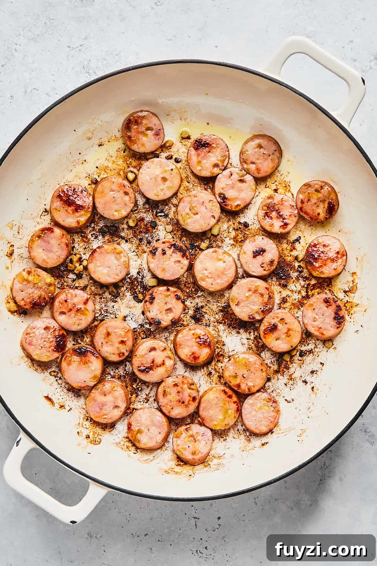 Skillet Chicken and Apple Sausage Stir Fry Recipe 6 Browning chicken apple sausage slices in skillet
