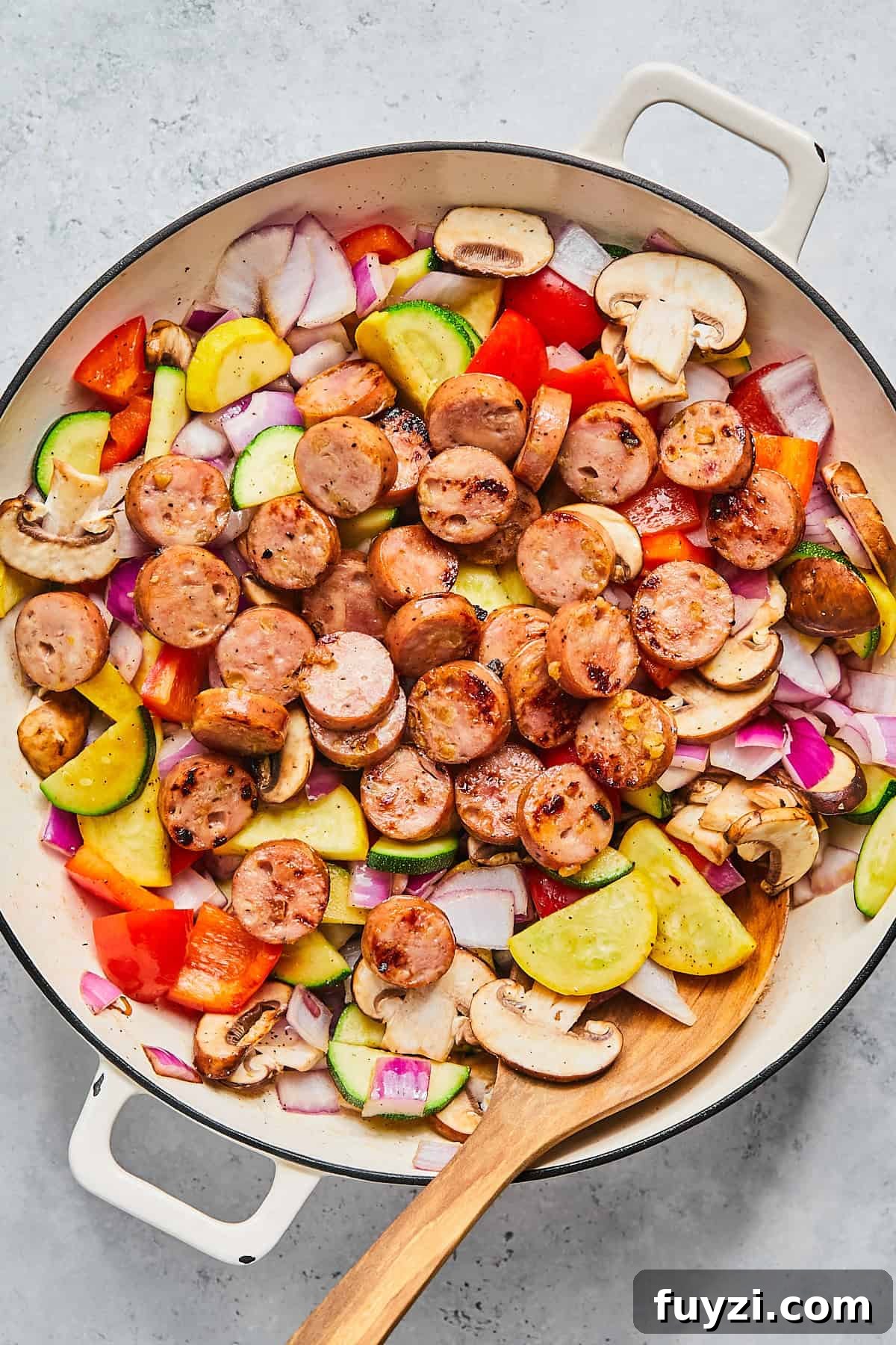 Skillet Chicken and Apple Sausage Stir Fry Recipe 8 Adding cooked sausage back into stir fry pan