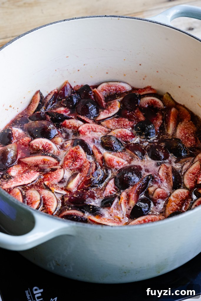 Homemade Fig Jam: Small-Batch Recipe 5 Large pot filled with figs and sugar boiling.