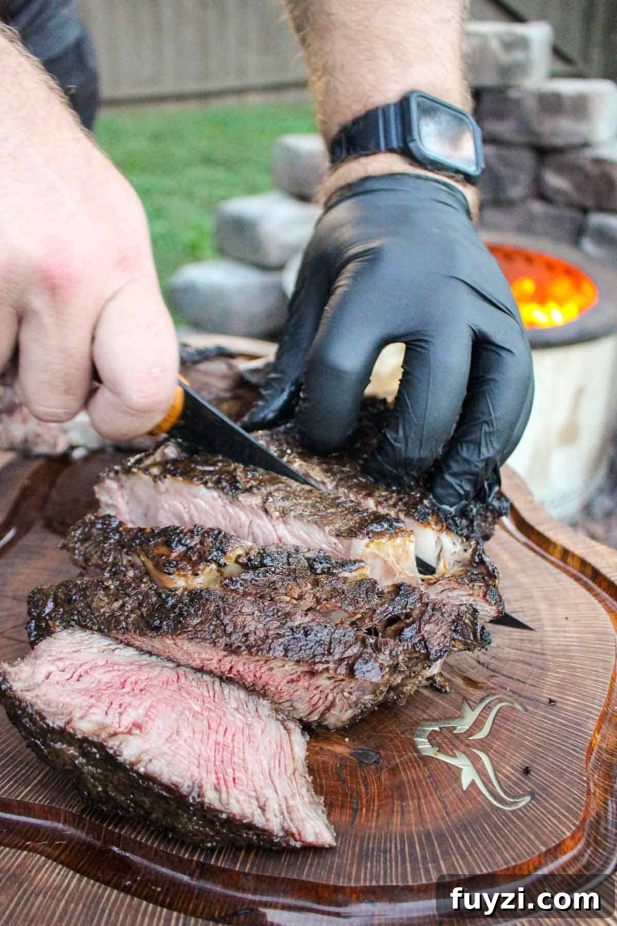 Slicing up the thick ribeye in preparation for the béarnaise sauce.