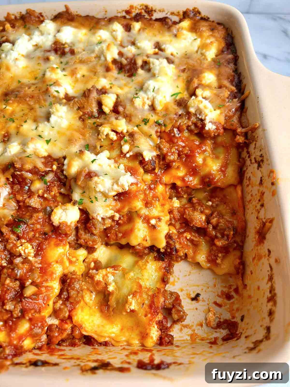 close up of ravioli in casserole dish.