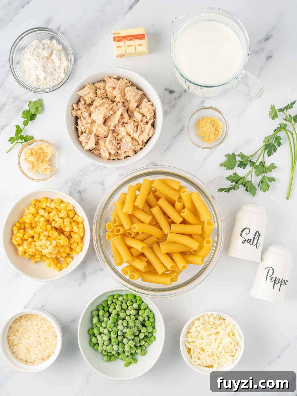 Creamy Tuna Pasta Bake with Crispy Cheesy Crust 3 Ingredients needed for creamy tuna pasta bake.