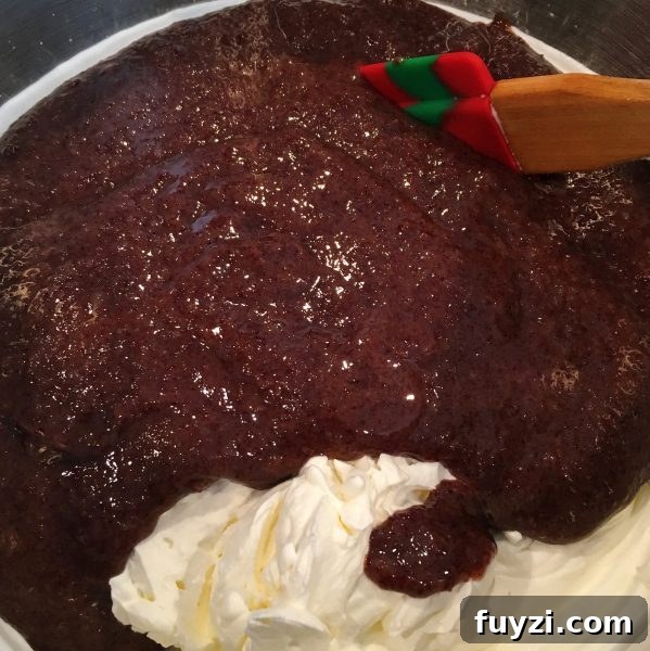 Folding whipped cream into set chocolate