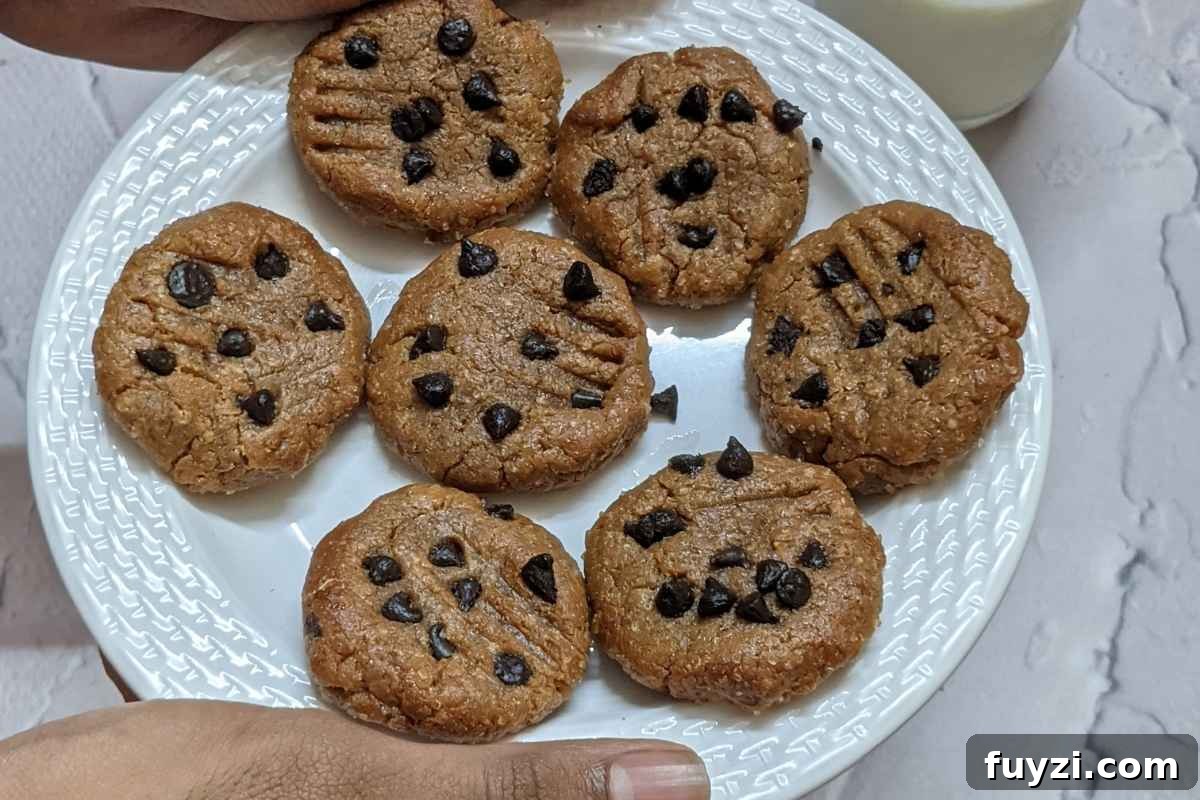 11 Irresistible Air Fryer Desserts to Make Tonight 12 peanut butter cookies on a plate
