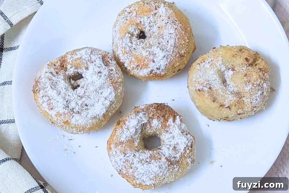 11 Irresistible Air Fryer Desserts to Make Tonight 5 Delicious air fryer donuts on a plate