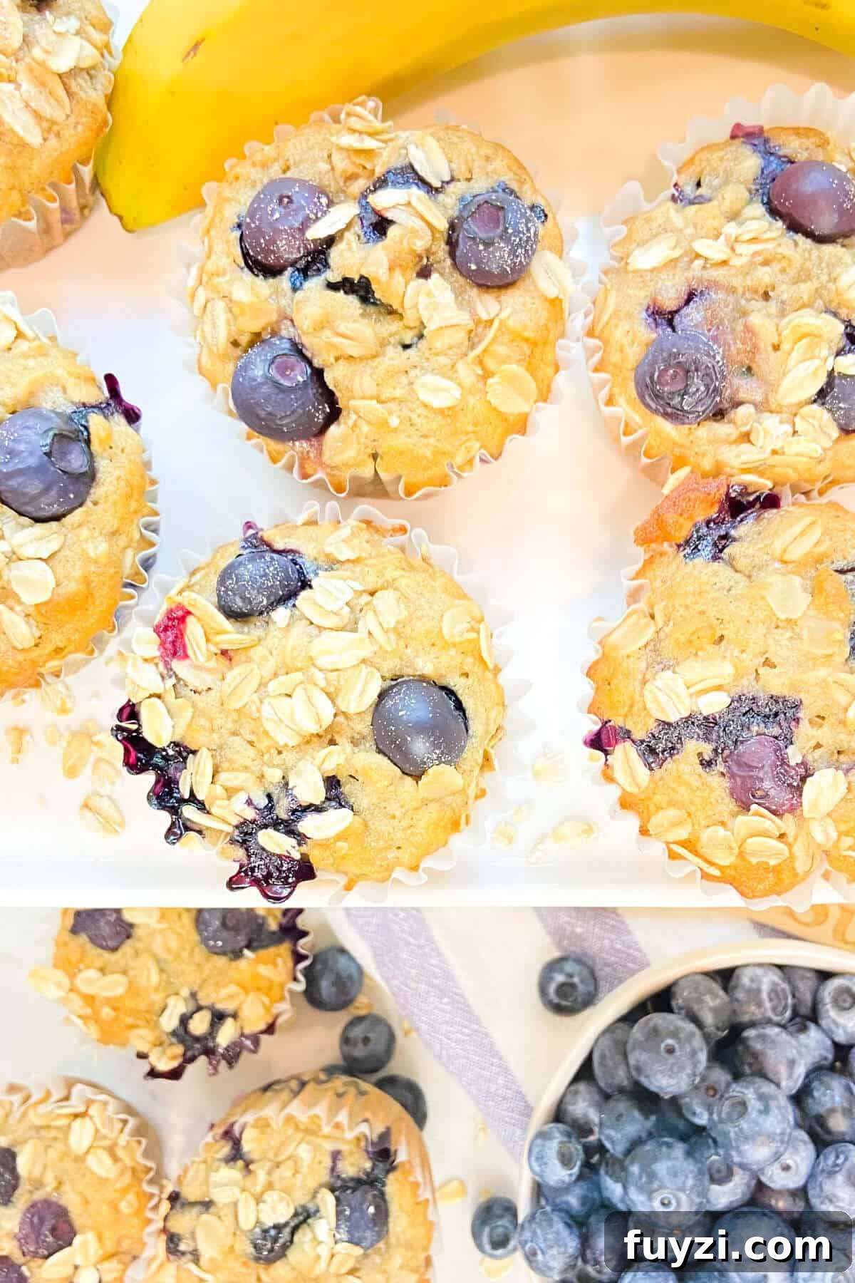 Muffins served with fresh fruit.
