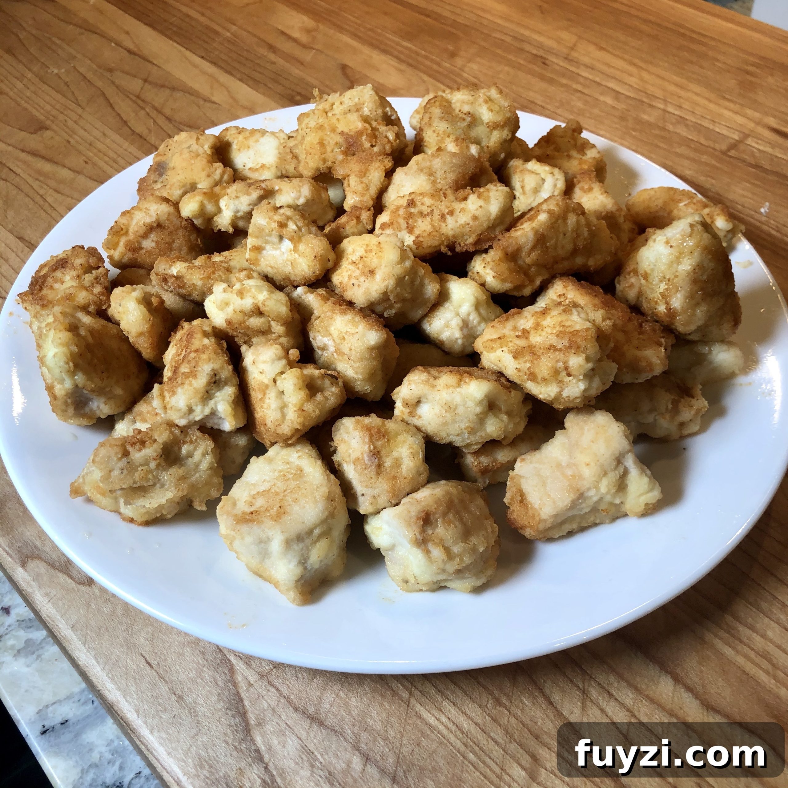 Crispy Restaurant-Style Sesame Chicken Recipe 9 Plated sesame chicken