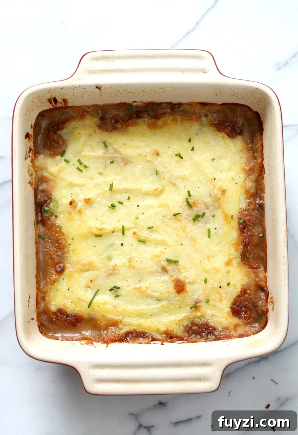 Vegan Shepherd's Pie - Mushroom and Lentil Shepherdless Pie with Gravy and Garlic mashed potatoes.