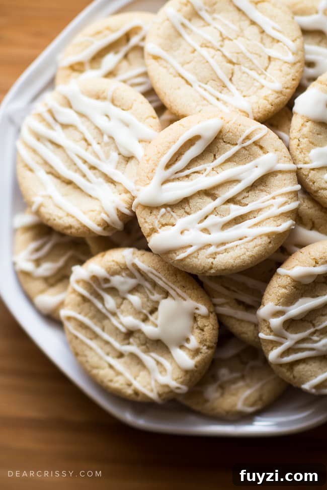 Soft Maple Sugar Cookie Recipe: Chewy Maple-Scented Cookies 5 Christmas cookie tray filled with soft maple cookies and sweet icing