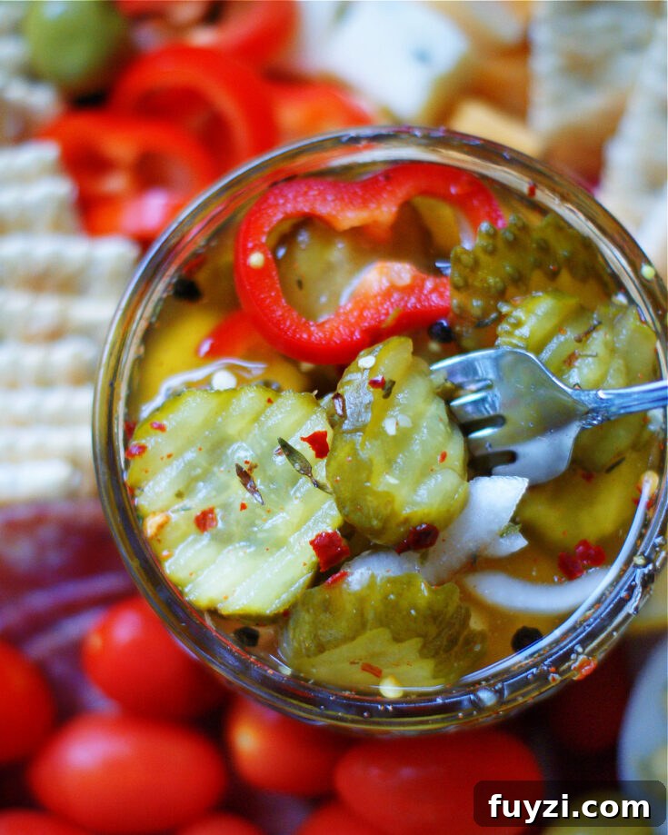 Sweet & spicy bread and butter pickles are a quick refrigerator pickle with a semi-homemade recipe that requires no canning.